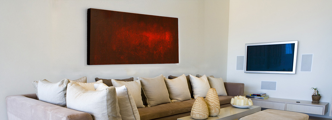 Red abstract painting by Andy Hahn hanging in room